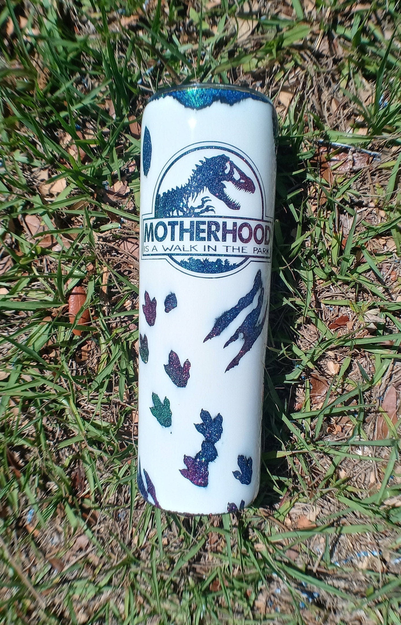 Motherhood is a walk in the park Tumbler